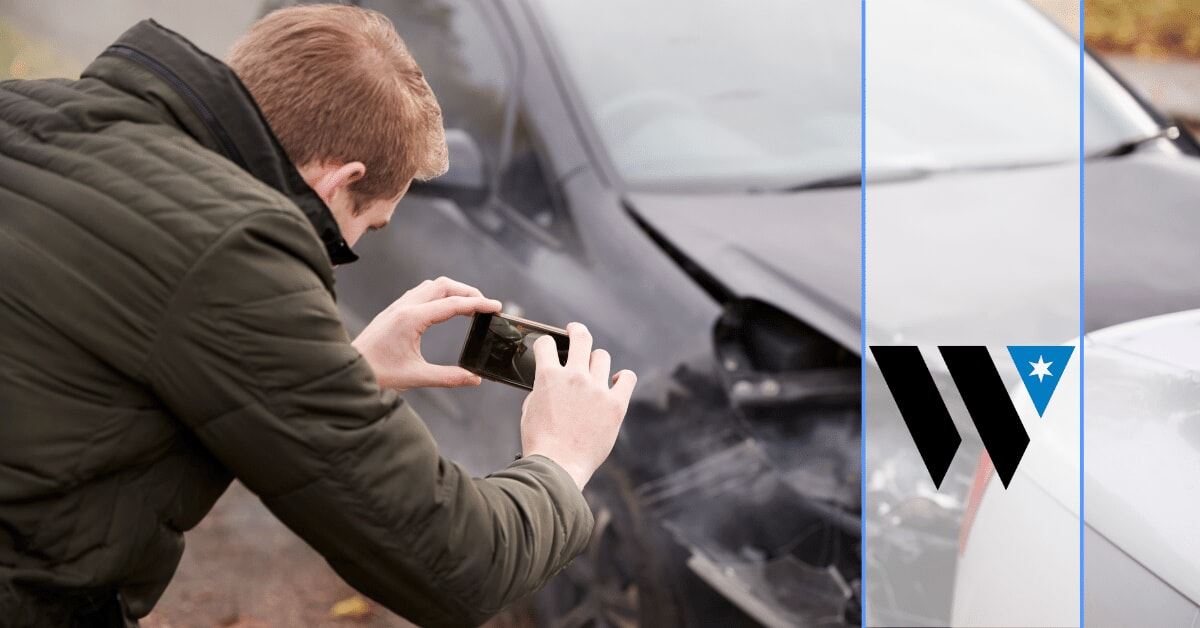 a man using a camera