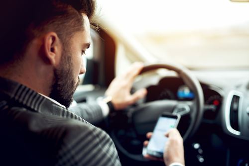 a man driving a car