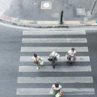 pedestrians crossing the street