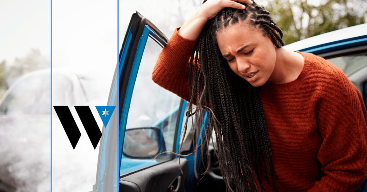 woman getting out of a car