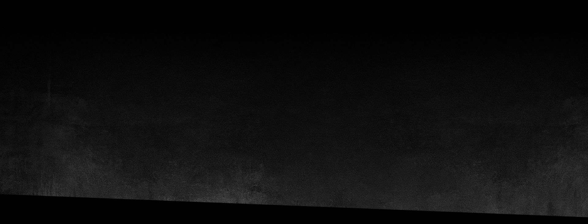 a dark background with a black background