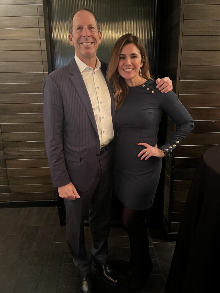 a man and woman posing for a picture