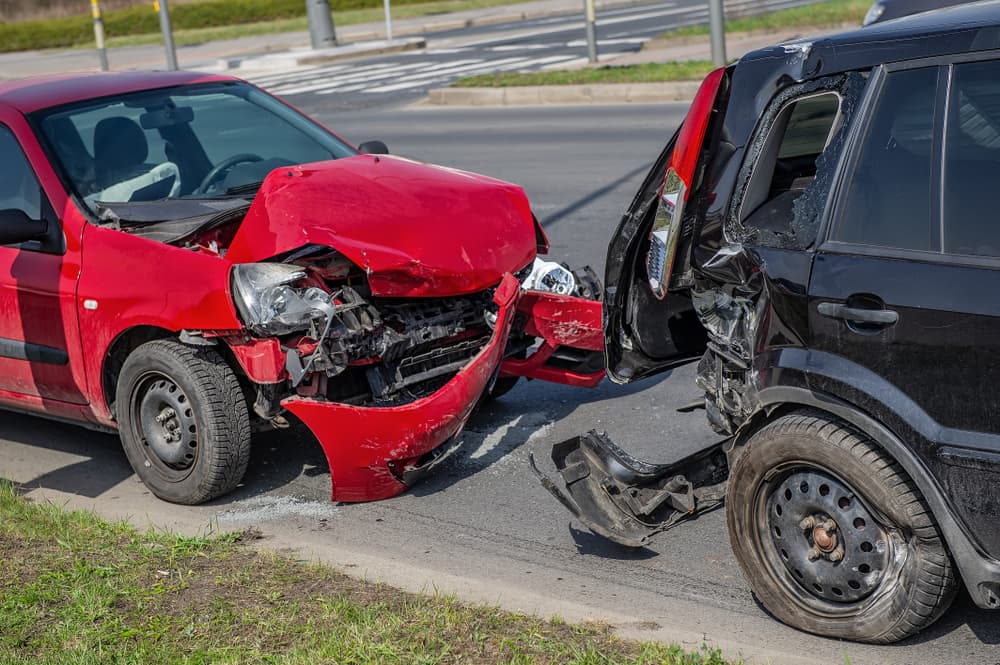Collision between two cars on road