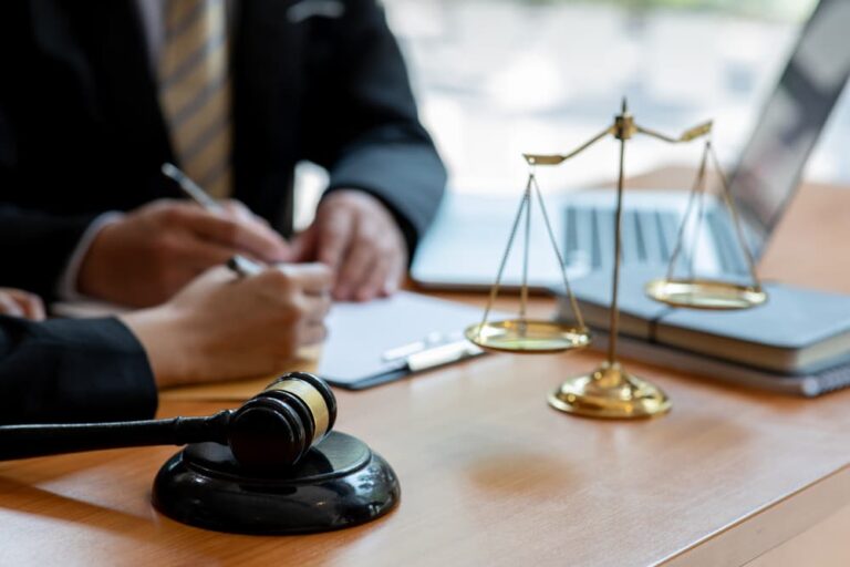 A personal injury lawyer meeting with client