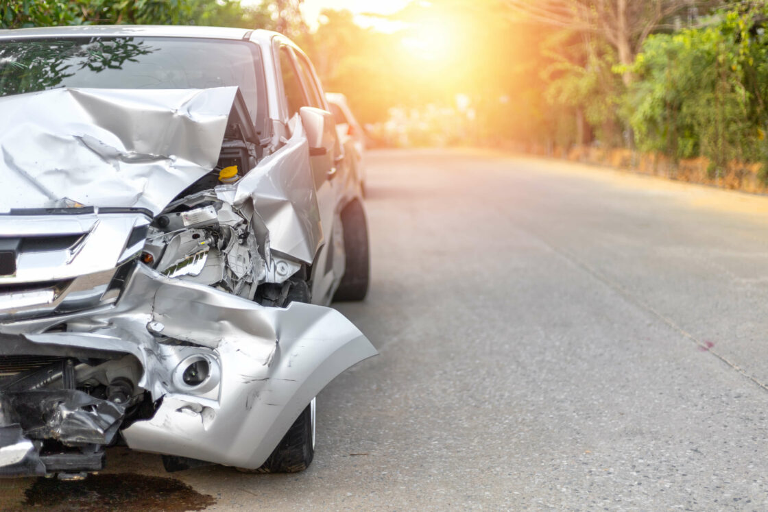 a wrecked car on a road