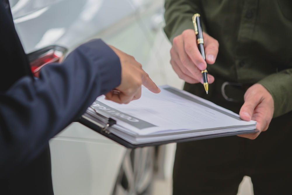 Driver meets with attorney to discuss serious accident claim, needing more help than just an adjuster.