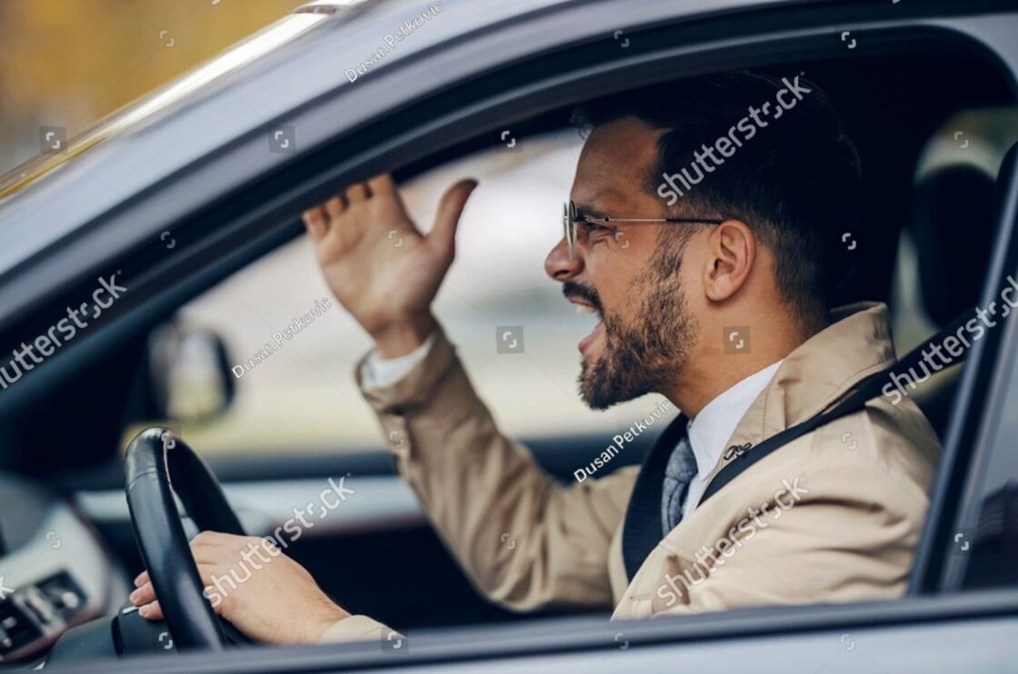 Elegant driver loses composure in heated road rage incident—showing how intent separates rage from careless driving.