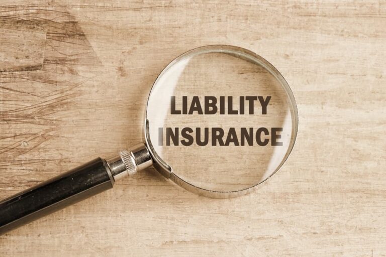 Liability Insurance & magnifying glass