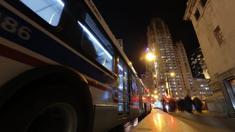 Stylized image of the CTA Bus at night in Downtown Chicago