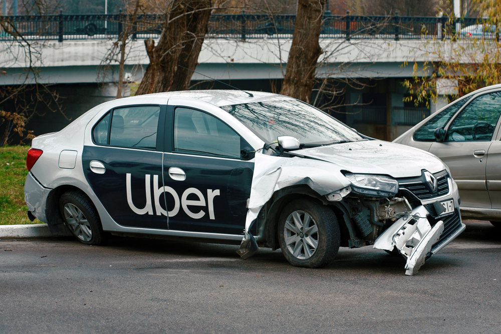 Car with Uber branding after a car accident